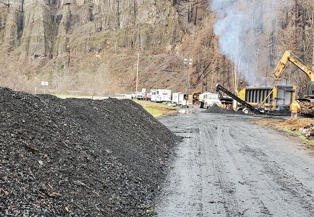Pile of black carbonized biomass (biochar)